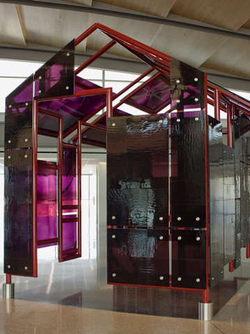 Mildred Howard, <em>The House That Cannot Be Any Color Than It’s Own, </em> 2011
<span>10.5 x 11 x 9 feet; clear mirrored glass laminated hand-blown aubergine art glass</span>